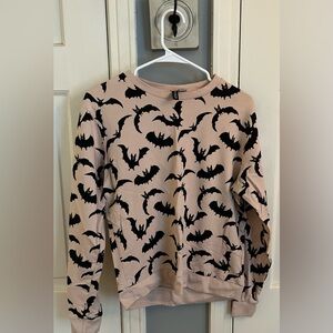 Divided Pink Top with Black Bat Design